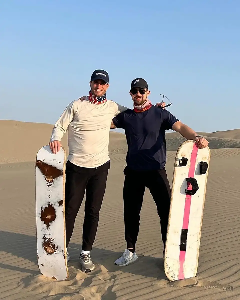 Kevin Pavlacic boarding in dunes